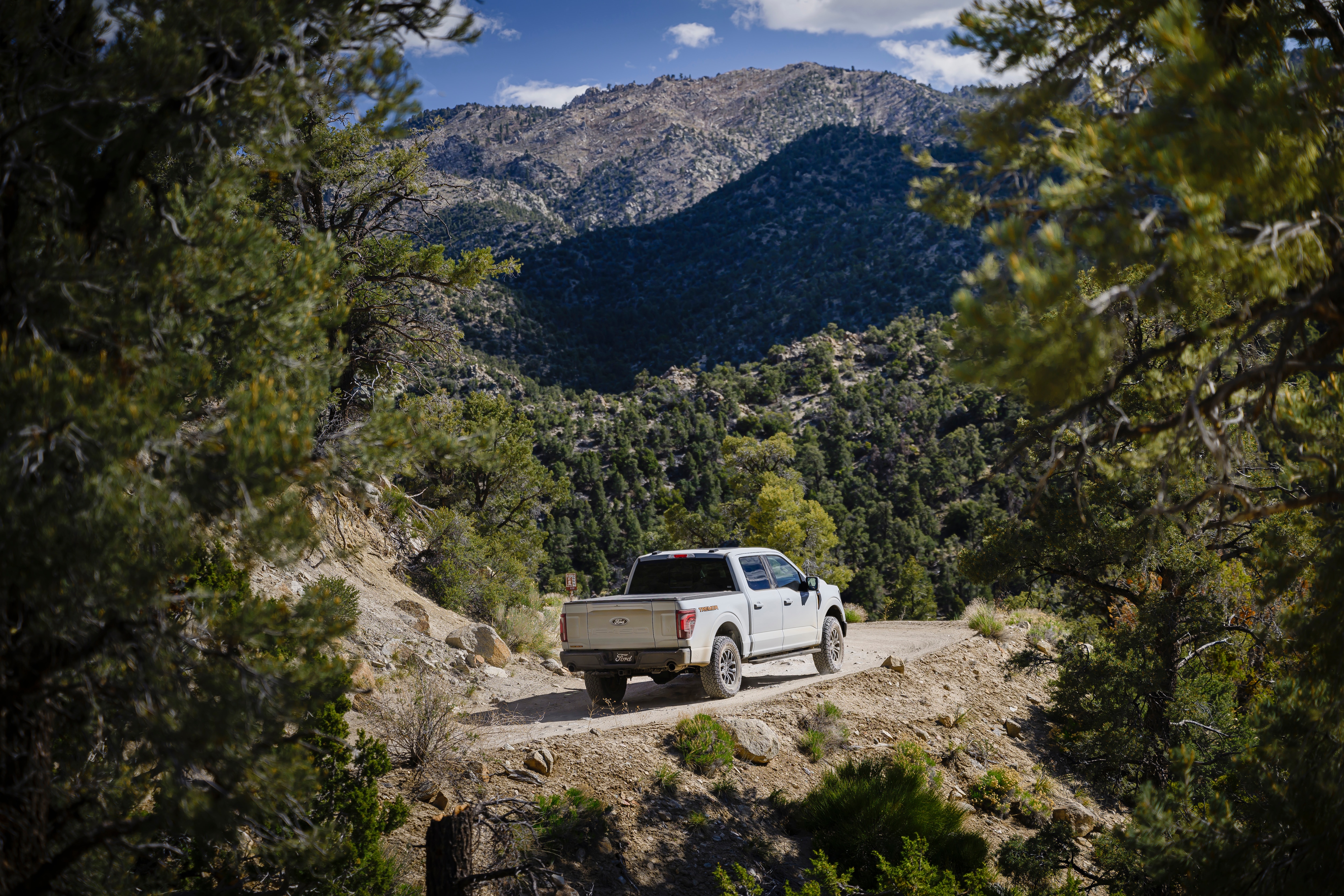 Professional driver on closed course. Always consult the Owner's Manual before off-road driving, know your terrain and trail difficult, and use appropriate safety gear.

